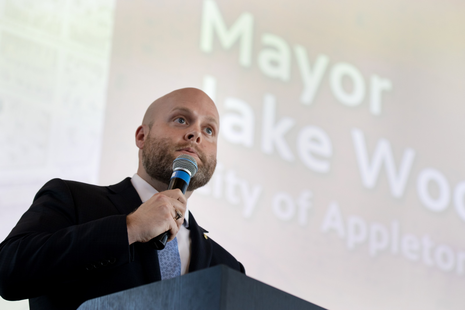 Appleton Mayor Jake Woodford '13 addresses the crowd at Poplar Hall.