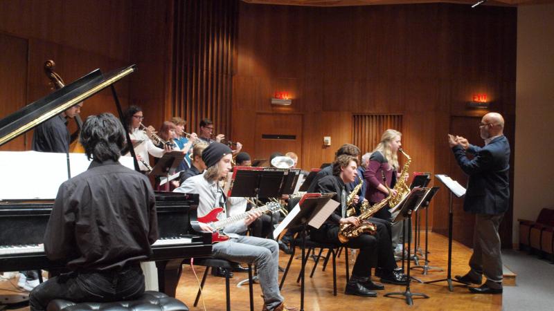 Members of Lawrence University's Jazz Workshop perform on stage.