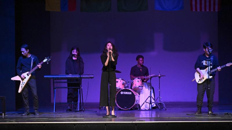 Five-piece student band performing onstage during 2022 Cabaret.